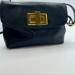 Black crossbody black bag with chunky cubed gold lock